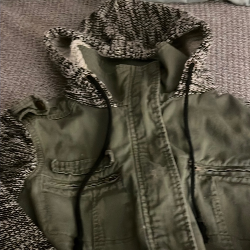 Green Jacket with Black and White Hood